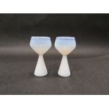 A pair of Kastrup white opaline wine glasses designed by Jacob Bang, early 1960's,