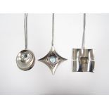 Three large 1970's stainless steel pendants with abstract modernist designs