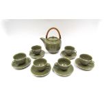 A Crowan Pottery (Harry & May Davis) studio pottery teapot with olive green glaze,