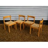 Four beech Carimate chairs designed by Vico Magistretti