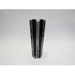 An Orrefors Martti Rytkonen designed glass vase, vertical ridged tapering body with black overlay ,