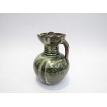 LADI KWALI OON MBE (Nigerian 1925-1984): A screw top stoneware vessel with sgrafitto decoration