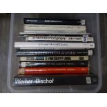 A collection of photography/art books including Lee Miller, Werner Bischof, Edward Sheriff Curtis,
