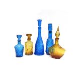 Five Empoli "Genie" glass bottles in blue and amber. Tallest 41.