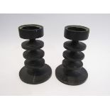 A pair of Robert Welch iconic candle holders, cast iron black finish.