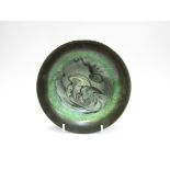 An Upsala Ekeby Pottery bowl with green and black swirled decoration. 20cm diameter x 6.
