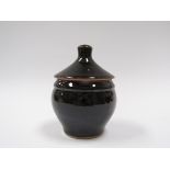 JEREMY LEACH (b.1941) A Lowerdown Pottery lidded preserve pot with tenmoku glaze.