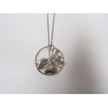 A Norman Grant silver openwork fushia pendant on silver chain, with iconic double loop top.