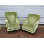 A Danish 1940's pair of armchairs with green velour upholstery,