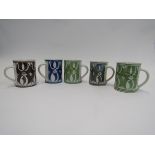 JENNY JOWETT - Five Aldermaston Pottery mugs in blue, green and brown. 9.
