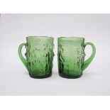Erik Hoglund - A pair of 'Adam & Eve' green glass tankards, 10.