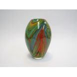An Italian glass vase with multi coloured striations,
