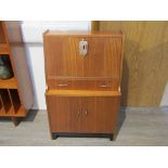 A small teak bureau, 62 stamped to back 61cm x 30.