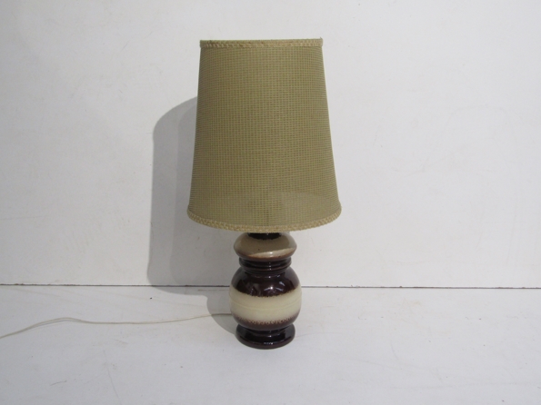 A West German treacle and beige glazed pottery table lamp with hessian type shade.