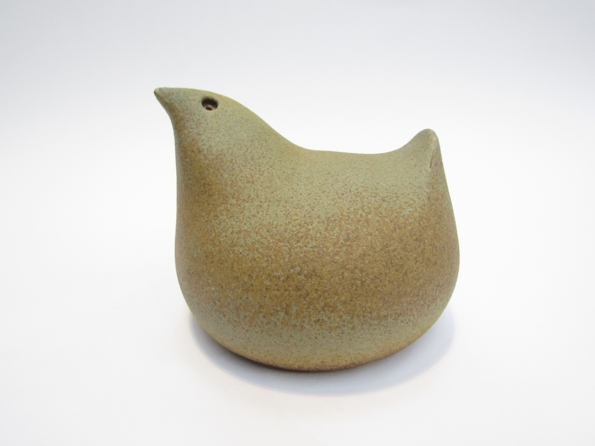 A stoneware figure of a bird, possibly Swedish, with speckled olive and ochre glaze, 10.