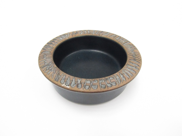 Lisa Larson for Gustavsberg - A stoneware bowl in blue with impressed motifs to flattened rim.