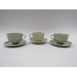 A Lowerdown Pottery pair of fluted cups with saucers together with a similar example by David Leach