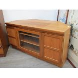 A Nathan Furniture teak corner television cabinet