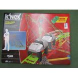 A boxed K'Nex Double Doom roller coaster building set