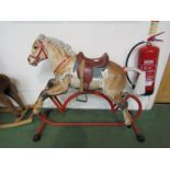 A 1950's Tri-Ang Cowboy Rocker rocking horse