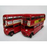 Two 1:24 scale diecast double decker Routemaster buses