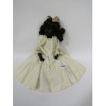 A black painted bisque head girl doll, head stamped R.