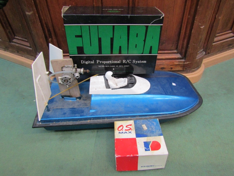 A RC hover boat and accessories