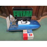 A RC hover boat and accessories