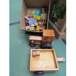 A box of mixed toys including wooden tractor and trailer,