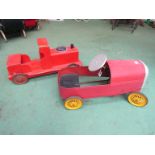 A vintage metal pedal car and a painted wooden locomotive (2)