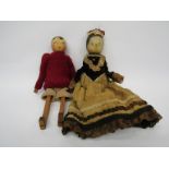 A 19th Century painted wooden doll as Queen Victoria (missing arms and one leg) together with