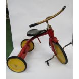 A childs metal tricycle