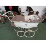 A vintage Silver Cross dolls pram