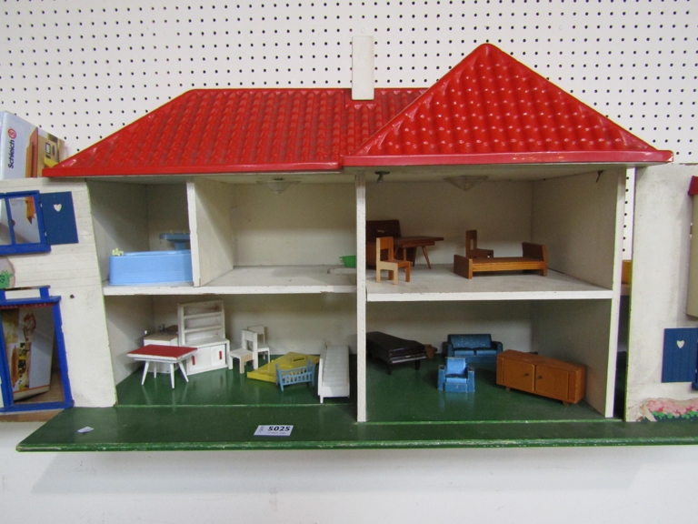 A 1950's doll's hosue and a quantity of furniture - Image 2 of 2