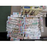 Twenty four Tamiya miniature model kits with sealed contents and instruments