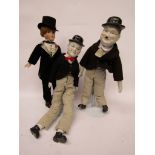 A pair of bisque head Laurel & Hardy dolls and a boy doll in formal dress (3)