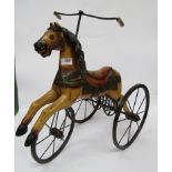 A Victorian style tricycle in the form of a horse