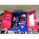 A Build a Bear wardrobe containing clothes amd accessories