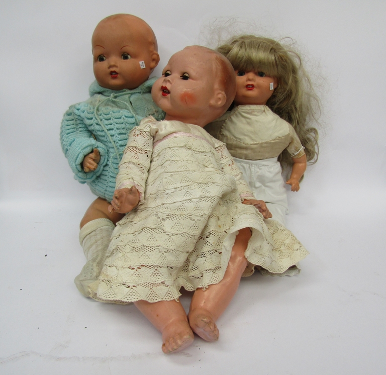 Three vintage composition dolls