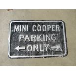 A pressed metal enamel 'Mini Cooper parking only'