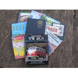 A box of Volkswagen related books including 'Original VW Bus' by Laurence Meredith and 'air cooled