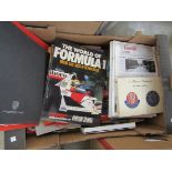 A box of magazines including Ferrari News,