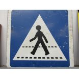 Blue and white pedestrian crossing metal sign