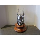 A chromed 'Rover' Viking head mascot mounted on a turned plinth