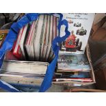 A box of transport related books and a bag of car books including Great racing cars of the
