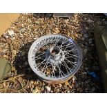 A 16'' MG spoked wheel