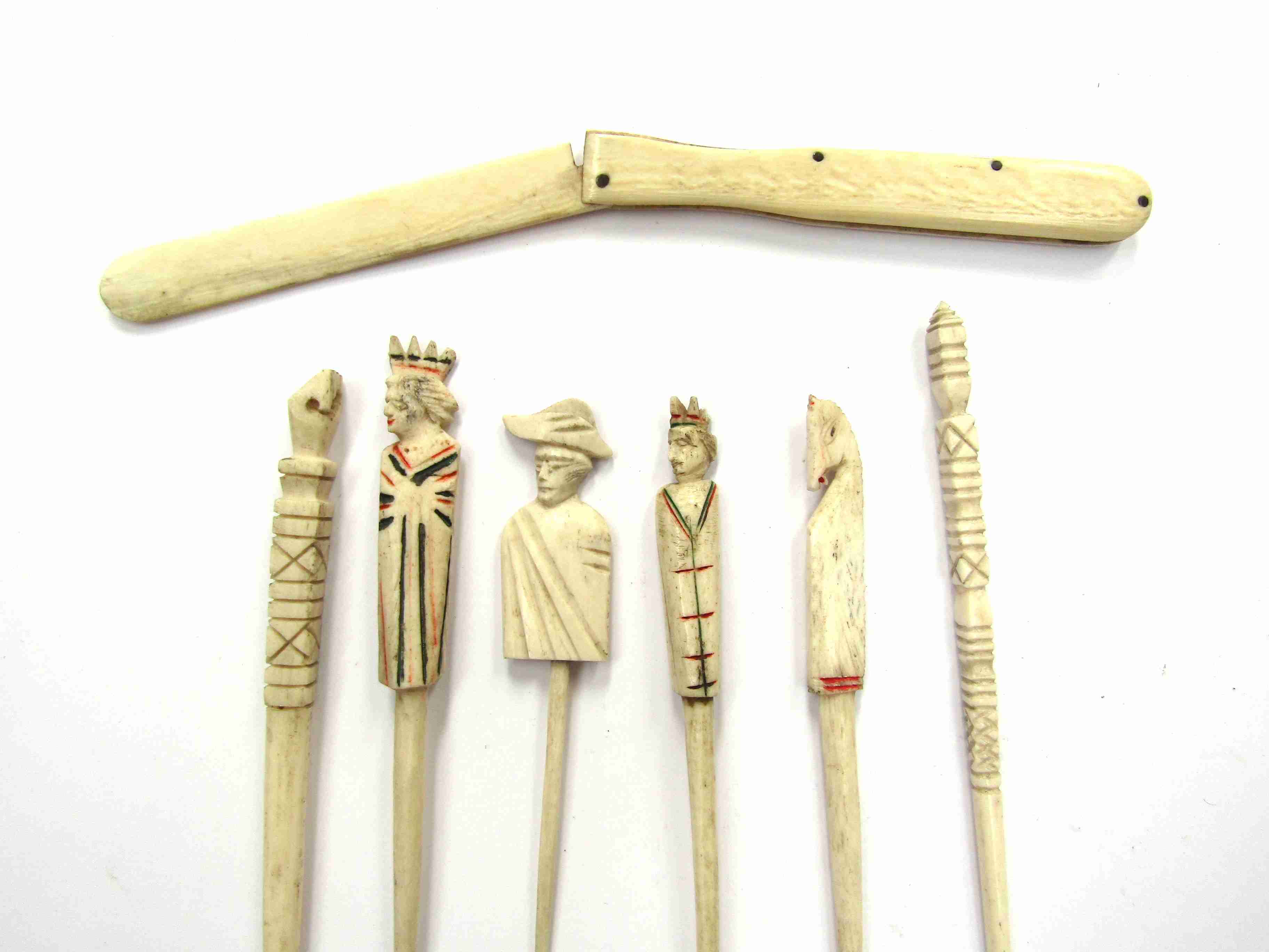 A quantity of Napoleonic hand-carved sticks including Napoleon etc.