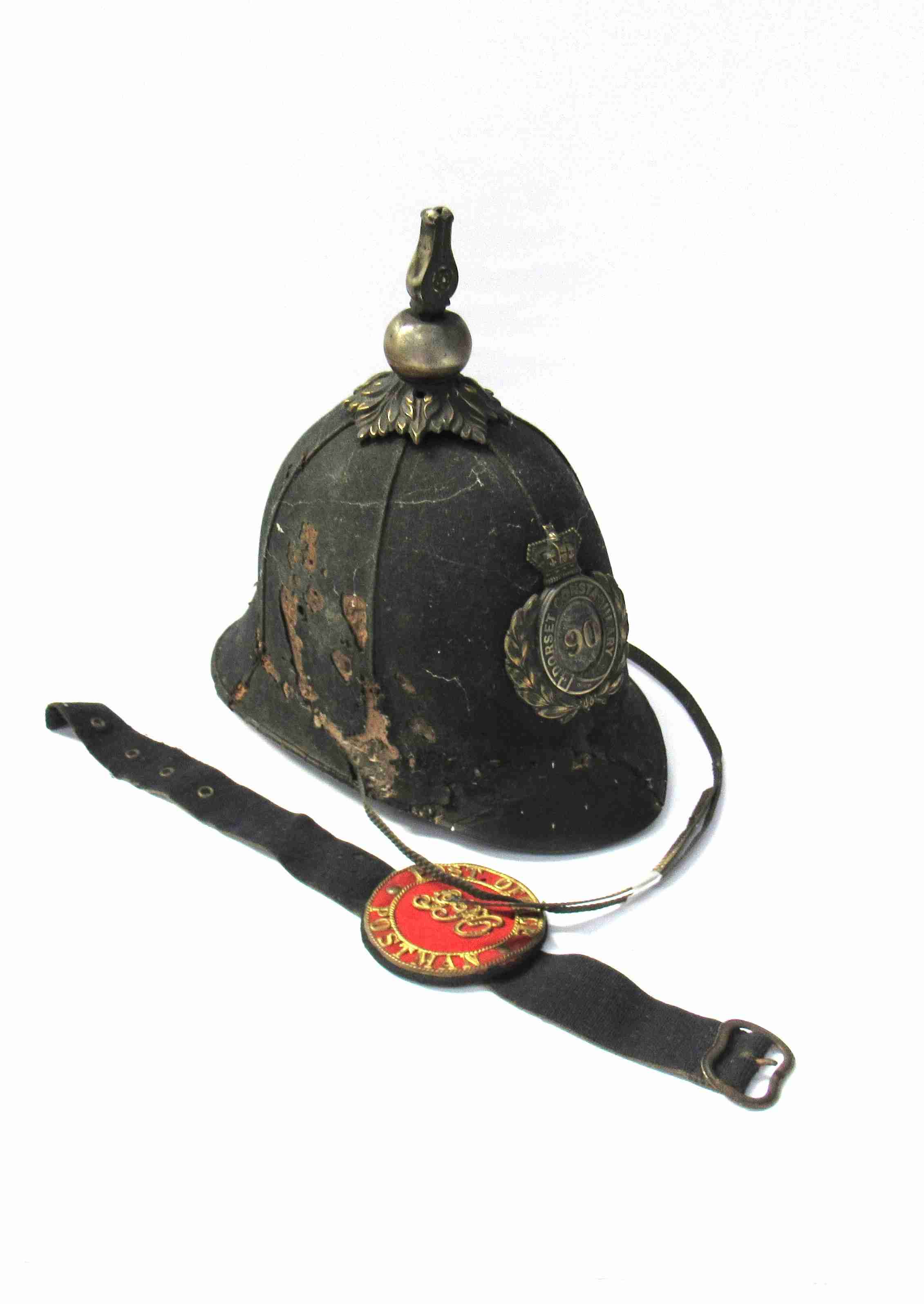 A 19th / early 20th Century police helmet for the Dorset Constabulary, very poor condition,