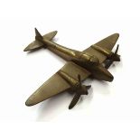 A cast brass model of a mosquito aircraft,