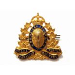 A George Crown Royal Canadian mounted police hat badge,